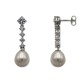 Pendiente de plata largo con circonitas y perla en forma de pera
